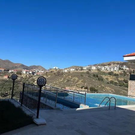 Ada Evi *